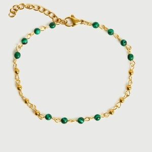 Green beaded bracelet. Brand new. Never been worn.